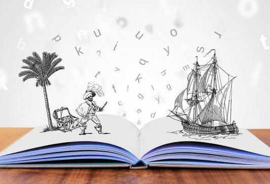 Un libro abierto del que salen letras, un esqueleto pirata, un tesoro y un barco 